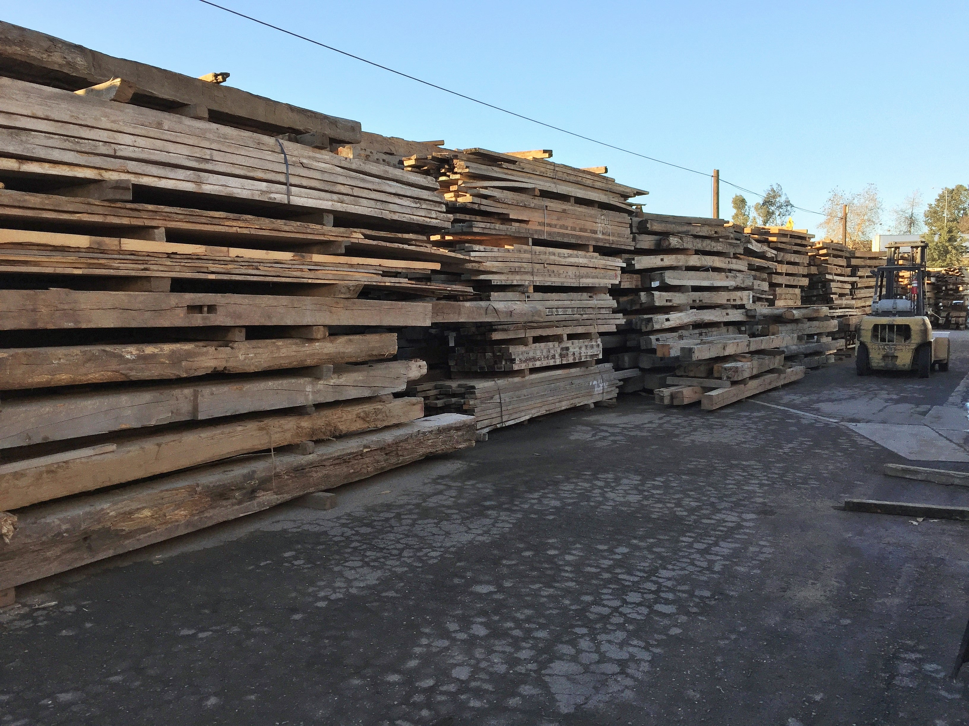 30,000 square feet of reclaimed barn wood mantel beam inventory